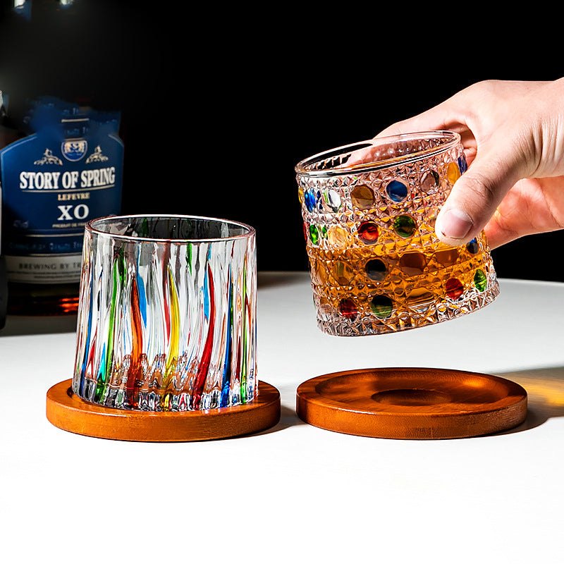 Hand drawn rotating whiskey glasses
